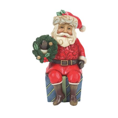 516233 Mini Santa Sitting On Gifts
